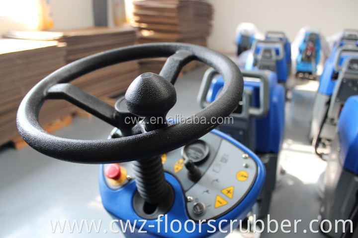 Automatic ride on floor tile cleaning machine with dual brush